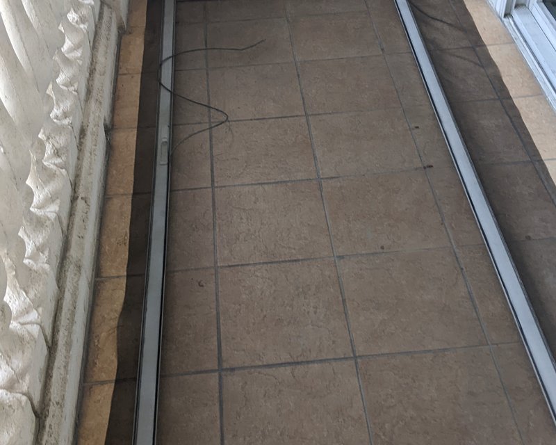 Sliding screen door frame removed for repair
